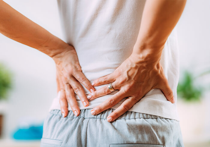 How can a person manage sciatic nerve pain at night?
